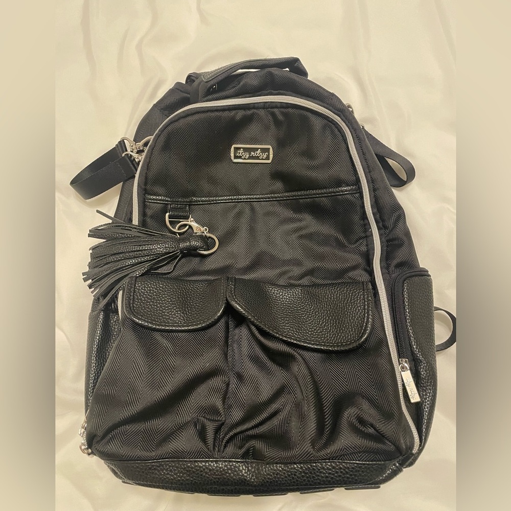 Itzy ritzy Boss diaper bag in black. Lightly used but does have some wear